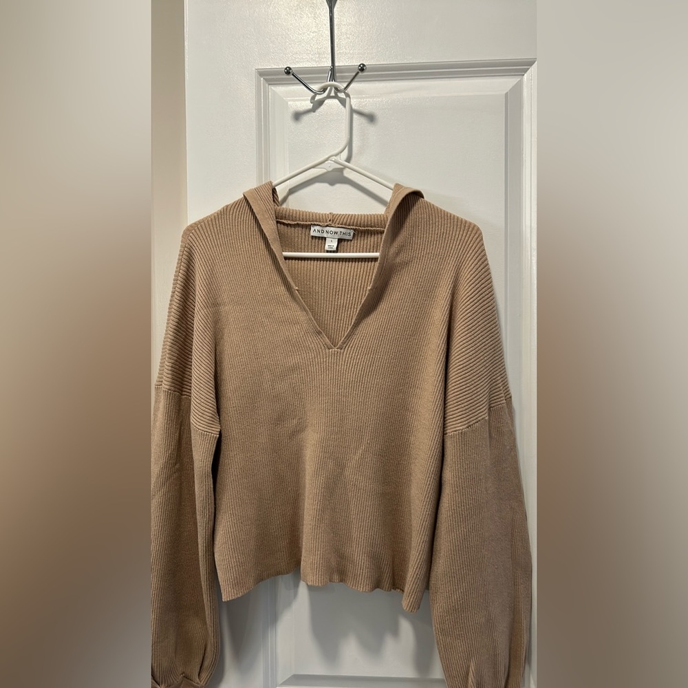 And now This sweater